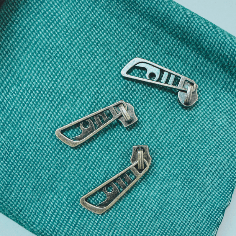 zipper zoo | schieber | messing antik - floydthefox